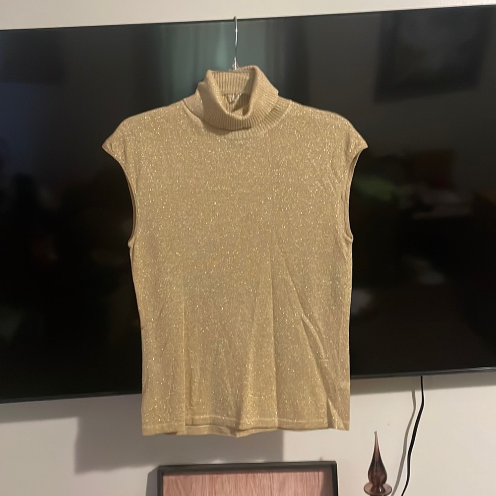 This is a cute sleeveless top made just for you by The Limited.